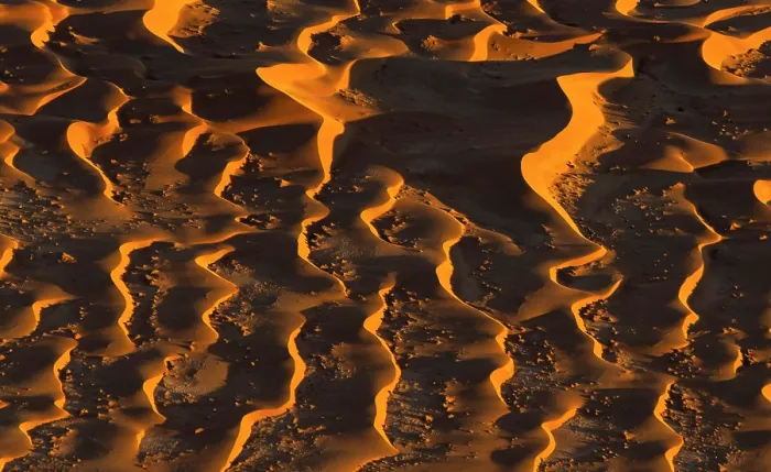 Framed Print : Aerial view of a pattern of golden sand dunes at sunrise, Sossusvlei, Namib-Naukluft National Park, Namib Desert, Namibia Framed Print : Aerial view of a pattern of golden sand dunes at sunrise, Sossusvlei, Namib-Naukluft National Park, Namib Desert, Namibia