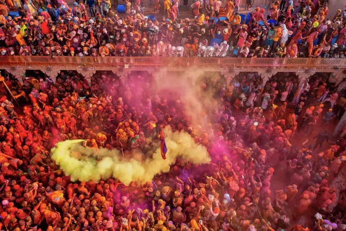 Framed Print : Aerial view of people celebrating the holy colour festival at Shri And Baba Temple, Nandgaon, Uttar Pradesh, India Framed Print : Aerial view of people celebrating the holy colour festival at Shri And Baba Temple, Nandgaon, Uttar Pradesh, India