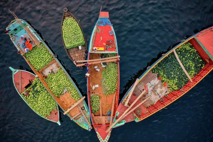 Framed Print : Aerial view of people working on commercial boats with fruits, Buriganga river, Keraniganj, Dhaka, Bangladesh Framed Print : Aerial view of people working on commercial boats with fruits, Buriganga river, Keraniganj, Dhaka, Bangladesh