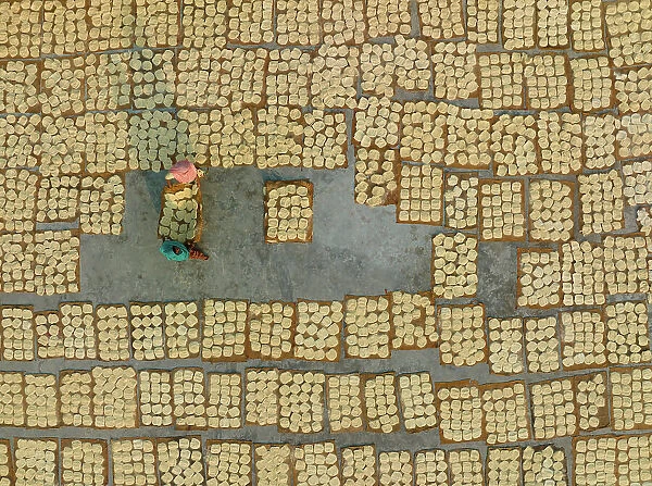 Aerial view of people working in the traditional vermicelli factory in Bogura, Bangladesh