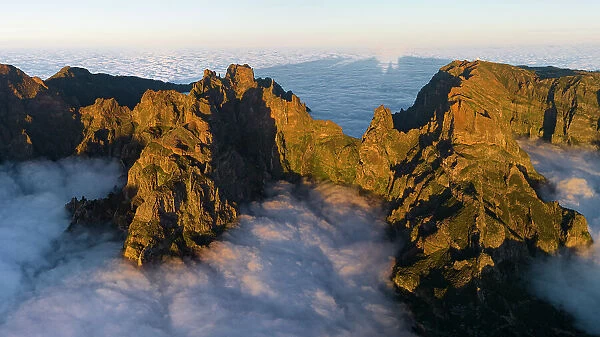 aerial view of Pico do Arieriro during a warm spring sunset, Madeira, Portugal