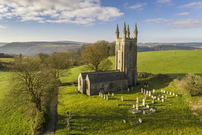Framed Print : Aerial view of the pretty Church of All Saints in Dunterton, Devon, England. Spring (March) 2021 Framed Print : Aerial view of the pretty Church of All Saints in Dunterton, Devon, England. Spring (March) 2021