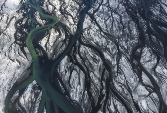Framed Print : Aerial view of a river delta after a winter snowstorm in the southern part of Iceland. Thorsa river, Iceland