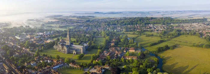 Framed Print : Aerial view over Salisbury and Salisbury Cathedral on a misty summer morning, Salisbury Framed Print : Aerial view over Salisbury and Salisbury Cathedral on a misty summer morning, Salisbury
