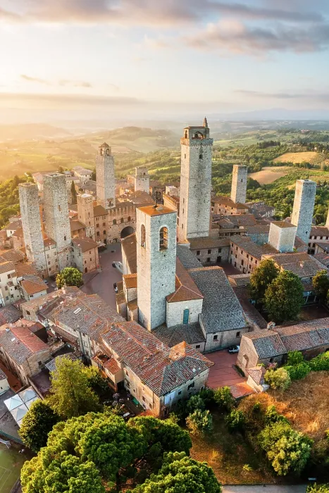 Framed Print : Aerial view of San Gimignano with its characteristic towers at sunrise. San Gimignano, Siena province, Tuscany, Italy Framed Print : Aerial view of San Gimignano with its characteristic towers at sunrise. San Gimignano, Siena province, Tuscany, Italy