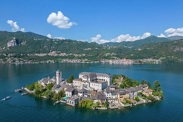 Aerial view of San Giulio island and Lake Orta in the summer. Orta Lake, Province of Novara, Piedmont, Italy