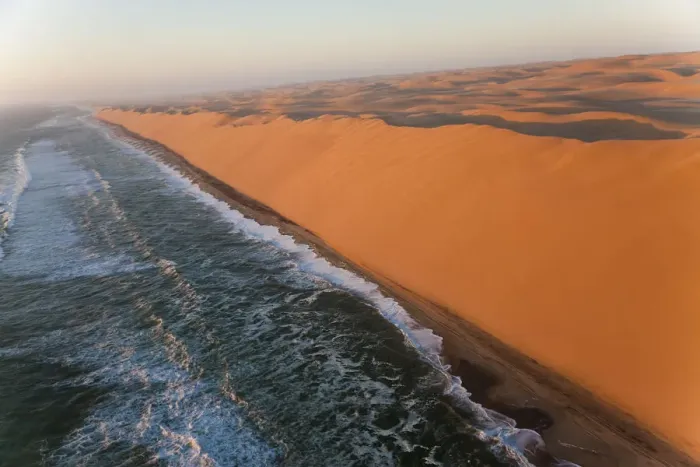 Framed Print : Aerial view over sand dunes & sea, Namib Desert, Namibia