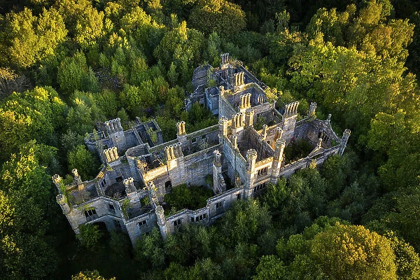 Aerial view showing the ruins of Dunmore House as it slowly becomes reclaimed by nature, Airth, Stirlingshire, Scotland. Autumn (September) 2022