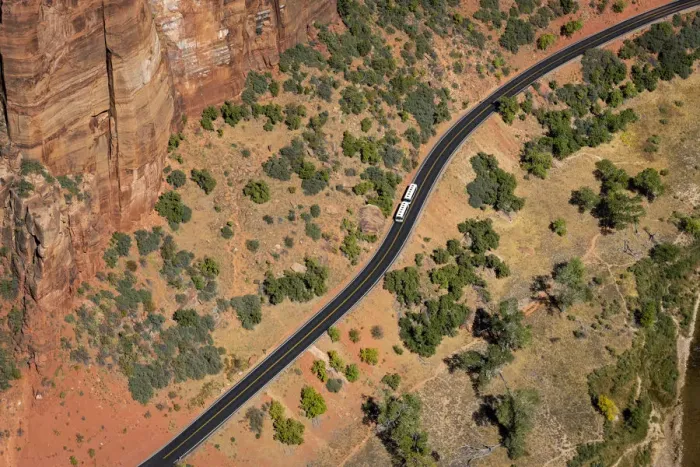 Framed Print : Aerial view of shuttle bus on the scenic drive road taken from Angels Landing Framed Print : Aerial view of shuttle bus on the scenic drive road taken from Angels Landing