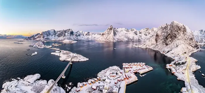 Framed Print : Aerial view of snowcapped Reinebringen mountain overlooking Reine Bay and the cold arctic sea, Reine, Lofoten Islands, Norway Framed Print : Aerial view of snowcapped Reinebringen mountain overlooking Reine Bay and the cold arctic sea, Reine, Lofoten Islands, Norway