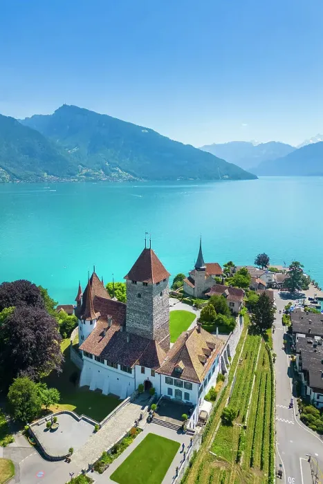 Framed Print : Aerial view of Spiez Castle on shores of lake Thun in summer. Bernese Oberland, Frutigen-Niedersimmental administrative district, Canton of Bern, Switzerland Framed Print : Aerial view of Spiez Castle on shores of lake Thun in summer. Bernese Oberland, Frutigen-Niedersimmental administrative district, Canton of Bern, Switzerland