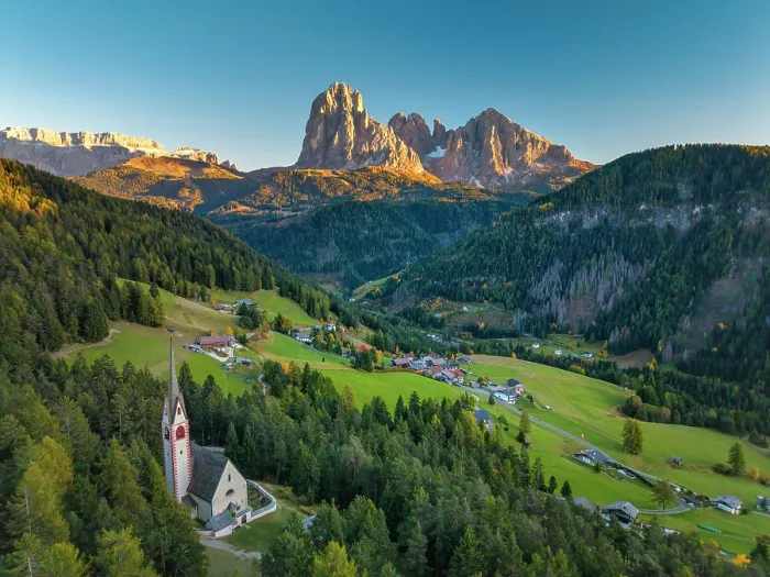 Framed Print : Aerial View over St. Jacob Church with Sassolungo Mountain in the Background, Ortisei - St. Ulrich, Trentino Alto Adige, Dolomites, Italy Framed Print : Aerial View over St. Jacob Church with Sassolungo Mountain in the Background, Ortisei - St. Ulrich, Trentino Alto Adige, Dolomites, Italy