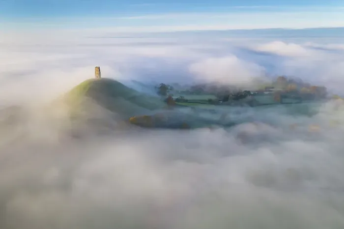 Framed Print : Aerial view of St Michael's Tower on Glastonbury Tor at dawn on a misty morning, Glastonbury, Somerset, England. Autumn (November) 2022 Framed Print : Aerial view of St Michael's Tower on Glastonbury Tor at dawn on a misty morning, Glastonbury, Somerset, England. Autumn (November) 2022
