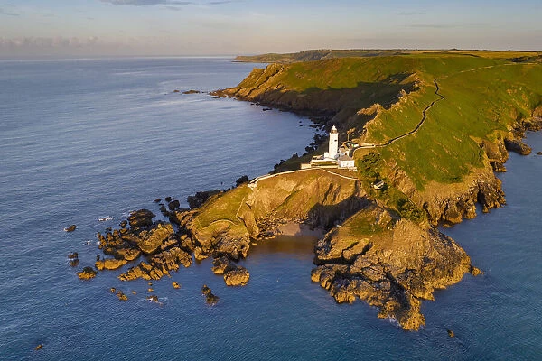 Aerial view of Start Point lighthouse and headland, South Hams, Devon, England
