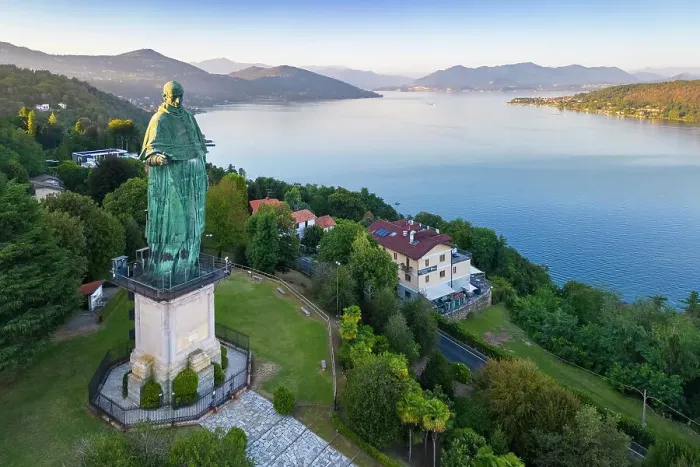 Framed Print : Aerial view of the Statue of San Carlo Borromeo during a summer sunset. Arona, Lake Maggiore, Piedmont, Italy Framed Print : Aerial view of the Statue of San Carlo Borromeo during a summer sunset. Arona, Lake Maggiore, Piedmont, Italy
