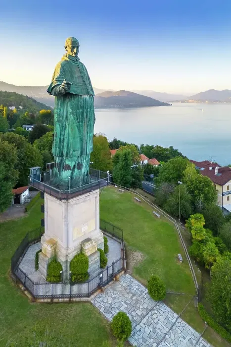Framed Print : Aerial view of the Statue of San Carlo Borromeo during a summer sunset. Arona, Lake Maggiore, Piedmont, Italy Framed Print : Aerial view of the Statue of San Carlo Borromeo during a summer sunset. Arona, Lake Maggiore, Piedmont, Italy