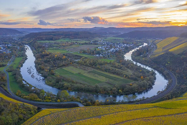 Aerial view on the sunset at the Saar horseshoe bend between Wiltingen and Kanzem with Altenberg vineyard, Saar valley, Hunsruck, Rhineland-Palatinate, Germany