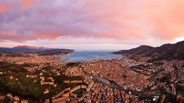 aerial view taken by drone of the beautiful city of La Spezia, during the warm sunset, La Spezia, Liguria, Italy