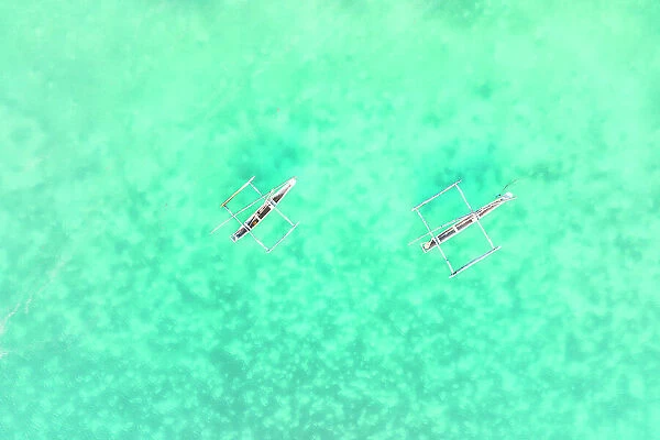 aerial view taken from the drone of fishermen boats called Dhows, anchored near the beach, Zanzibar, Tanzania