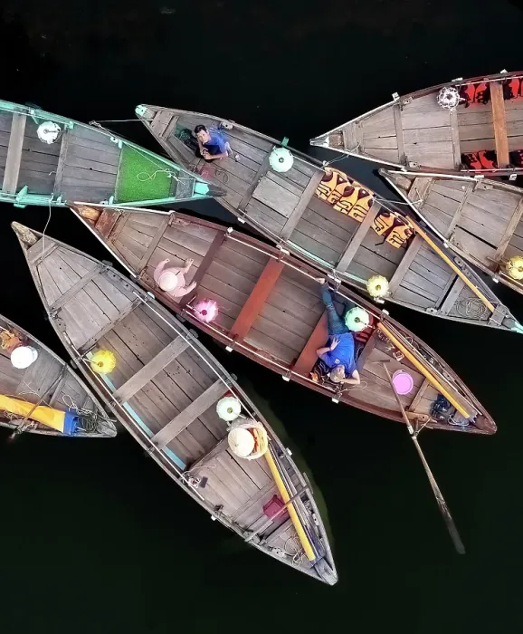 Framed Print : Aerial view of tourist boats on the Thu Bon River, Hoi An, Central Vietnam Framed Print : Aerial view of tourist boats on the Thu Bon River, Hoi An, Central Vietnam