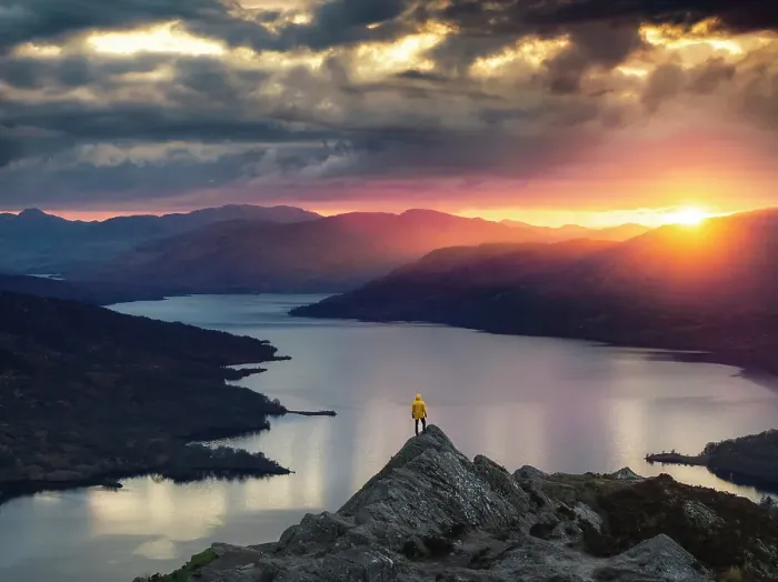 Framed Print : Aerial view of a tourist a t Ben A'an summit during summer with the view of Loch Katrine, Trossach, Stirling, Scotland, United Kingdom (MR)