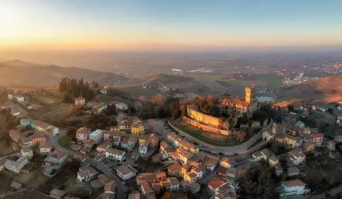 Framed Print : Aerial view of the town of Cigognola and its castle. Cigognola, Oltrepo wine region, Oltrepo pavese, Lombardy, Italy