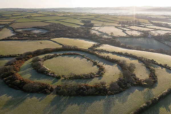 Aerial view of Tregeare Rounds Iron Age Hillfort near Pendoggett in North Cornwall, England. Spring (April) 2021