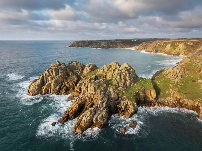 Framed Print : Aerial view of Treryn Dinas headland and Logan Rock near Porthcurno on the west coast of Cornwall, England. Winter (January) 2025 Framed Print : Aerial view of Treryn Dinas headland and Logan Rock near Porthcurno on the west coast of Cornwall, England. Winter (January) 2025