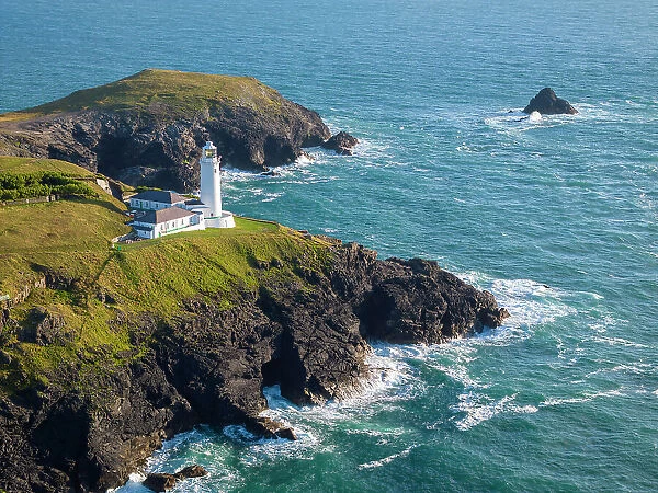 Aerial view of Trevose Head lighthouse in North Cornwall, England. Summer (August) 2023