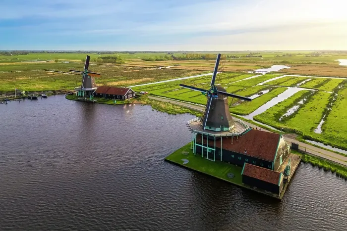 Framed Print : Aerial view of the typical windmills of Zaanse Schans on the river Zaan in spring. Zaanse Schans, North Holland, Zaanstad municipality, The Netherlands, Europe Framed Print : Aerial view of the typical windmills of Zaanse Schans on the river Zaan in spring. Zaanse Schans, North Holland, Zaanstad municipality, The Netherlands, Europe
