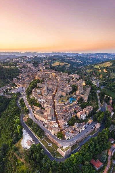 Aerial view of Urbino at dusk. Urbino, Marche, Italy, Europe