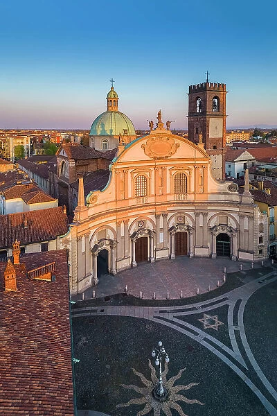 Aerial view of the Vigevano Cathedral and Piazza Ducale in spring at sunset. Vigevano, Lomellina, Province of Pavia, Lombardy, Italy