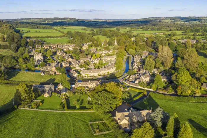 Framed Print : Aerial view over the village of Lower Slaughther in the Cotswolds, Gloustershire, England