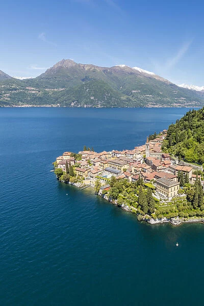 Aerial view of the village of Varenna frames by the blue water of Lake Como Lecco