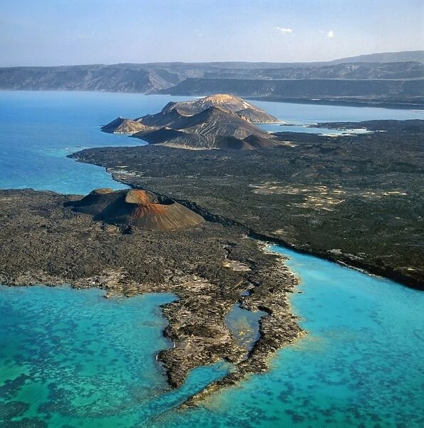 An aerial view of the volcanic cones at the inlet of Ghoubbet el Kharb (the Devils Throat), a region of high seismic activity where deep fractures in the lava continue to widen year by year