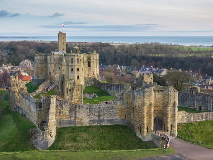 Framed Print : Aerial view of Warkworth Castle in Northumberland, England. Winter (March) 2025