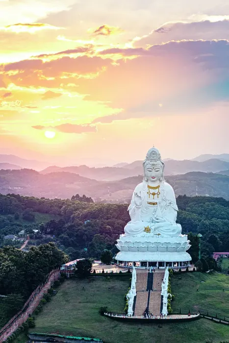 Framed Print : Aerial view of Wat Huay Pla Kang temple on top of lush green hills in sunset mist, Chiang Rai Province, Thailand