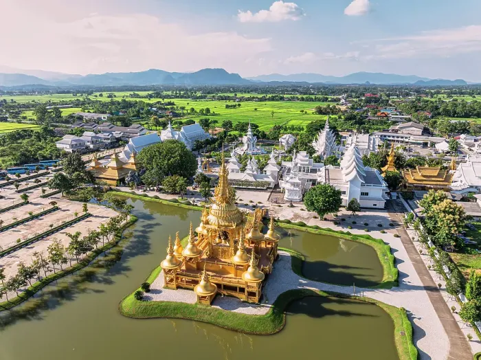 Framed Print : Aerial view of Wat Rong Khun also know as White Temple and golden stupa overlooking a lake, Chiang Rai, Thailand Framed Print : Aerial view of Wat Rong Khun also know as White Temple and golden stupa overlooking a lake, Chiang Rai, Thailand