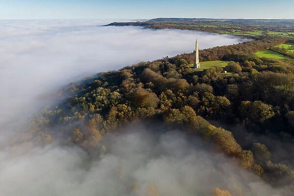 Aerial view of the Wellington Monument on a misty morning, Wellington, Somerset, England. Winter (December) 2022