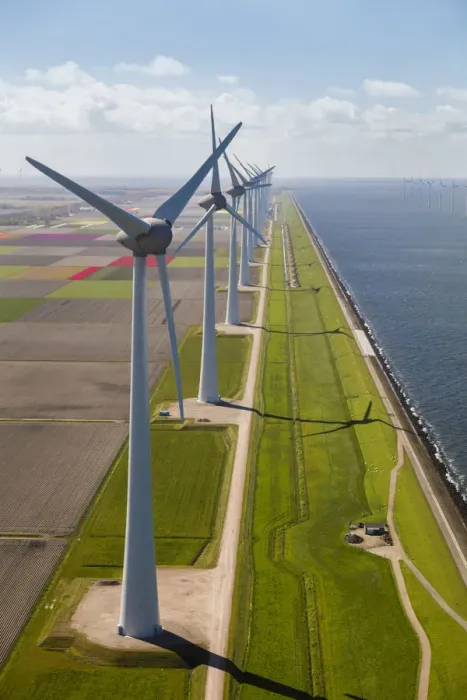 Framed Print : Aerial view of wind turbines on land and at sea, North Holland, Netherlands Framed Print : Aerial view of wind turbines on land and at sea, North Holland, Netherlands