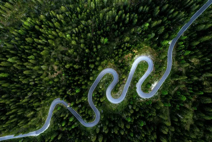Framed Print : Aerial view of winding mountain road through a forest in spring, Giau Pass, Dolomites, Veneto, Italy Framed Print : Aerial view of winding mountain road through a forest in spring, Giau Pass, Dolomites, Veneto, Italy