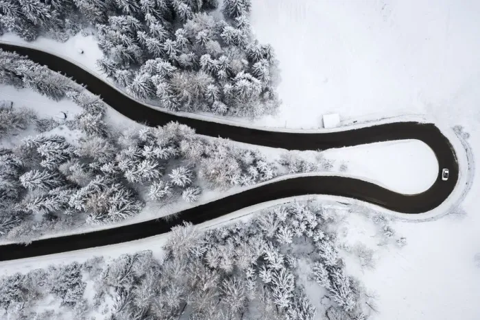 Framed Print : Aerial view of the winding road of the Presolana Pass after a winter snowfall Framed Print : Aerial view of the winding road of the Presolana Pass after a winter snowfall