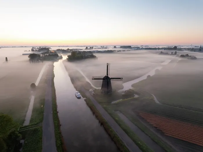 Framed Print : An aerial view of a windmill in the mist at dawn, North Holland, Netherlands Framed Print : An aerial view of a windmill in the mist at dawn, North Holland, Netherlands