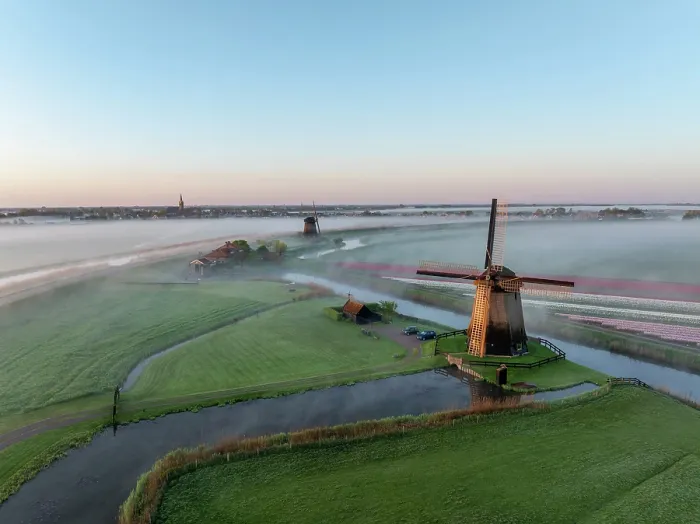 Framed Print : An aerial view of windmills & Schermerhorn in the mist at dawn, North Holland, Netherlands Framed Print : An aerial view of windmills & Schermerhorn in the mist at dawn, North Holland, Netherlands