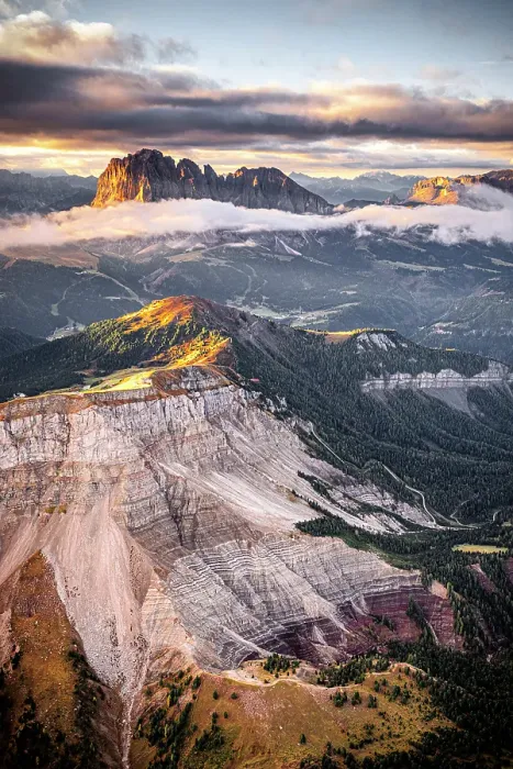 Framed Print : Aerial view of woods of Val Gardena with Sassolungo and Seceda emerging from autumn mist, Dolomites, South Tyrol, Italy Framed Print : Aerial view of woods of Val Gardena with Sassolungo and Seceda emerging from autumn mist, Dolomites, South Tyrol, Italy