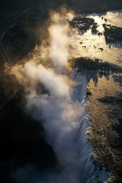 Aerial view of the Zambezi River as it plummets over