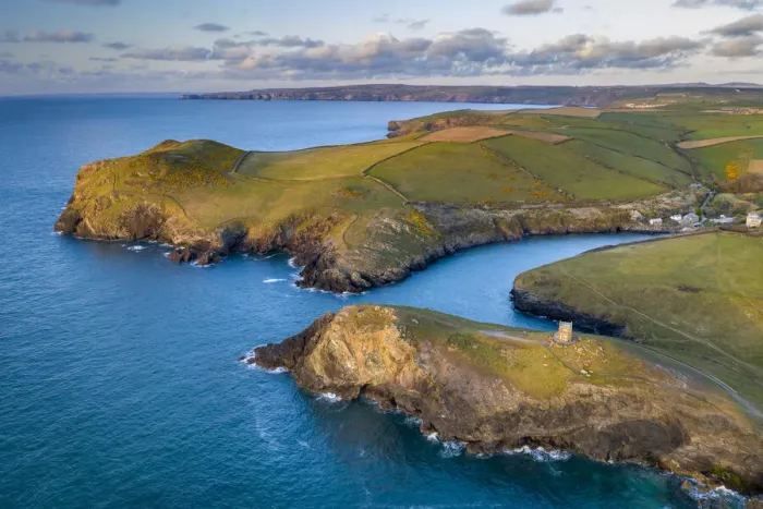 Framed Print : Aerial vista of Doyden Castle on the headland at Port Quin, Cornwall, England Framed Print : Aerial vista of Doyden Castle on the headland at Port Quin, Cornwall, England