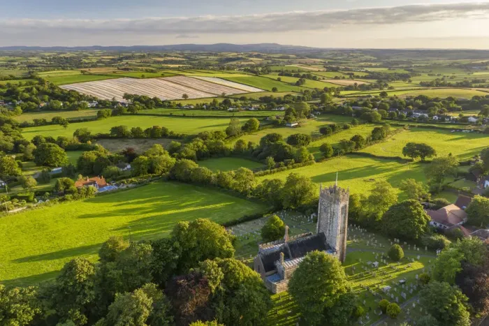 Framed Print : Aerial vista of the rural village of Morchard Bishop, Devon, England. Summer (July) 2020 Framed Print : Aerial vista of the rural village of Morchard Bishop, Devon, England. Summer (July) 2020