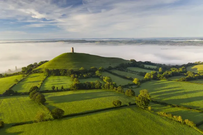 Framed Print : Aerial vista of St Michaels Tower on Glastonbury Tor, Somerset, England Framed Print : Aerial vista of St Michaels Tower on Glastonbury Tor, Somerset, England