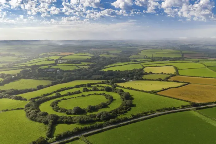Framed Print : Aerial vista of Tregeare Rounds Iron Age Hillfort surrounded by Cornish countryside Framed Print : Aerial vista of Tregeare Rounds Iron Age Hillfort surrounded by Cornish countryside